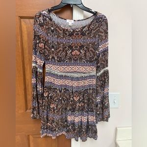 Sun and shadow adorable tan and brown pattern dress with open cream lattice work